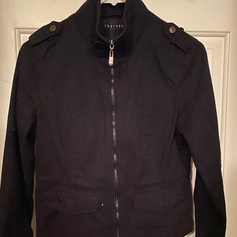 Black Blazer. Size medium but fits tight.